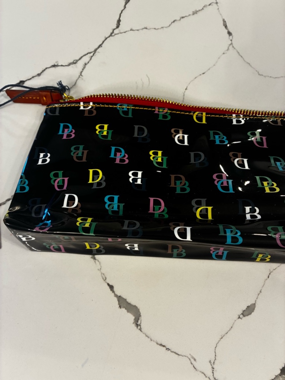 Dooney & Bourke Black Gloss Multicolor DB Logo Cosmetic case